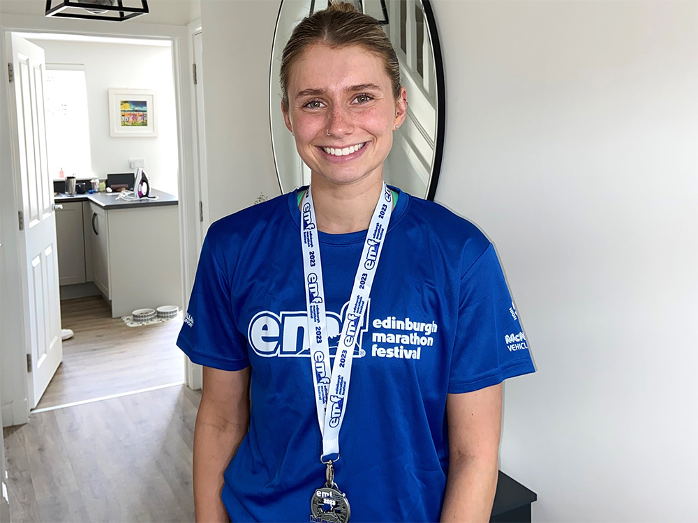 Bath Half marathon - Lucy with medal